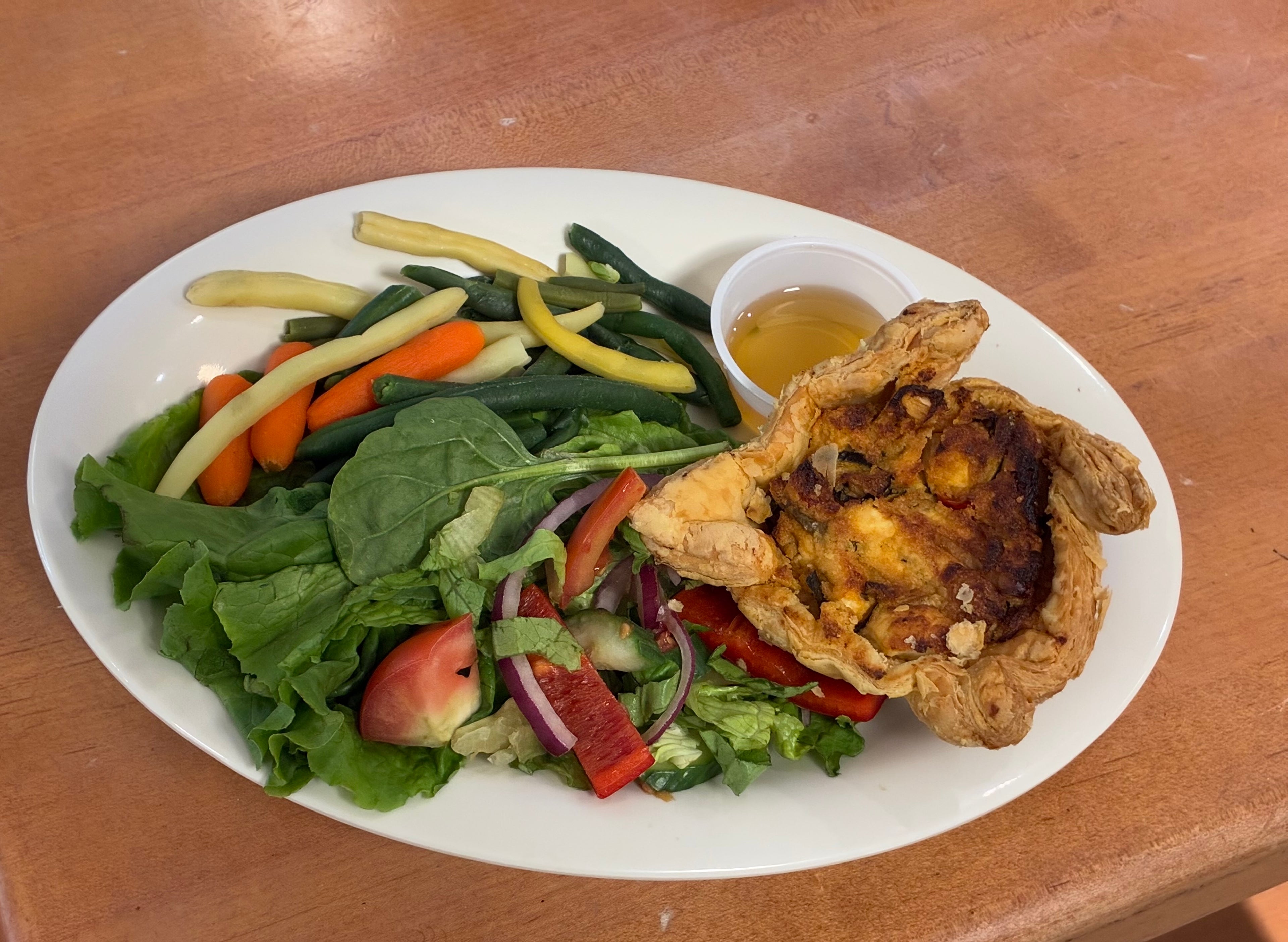 Puff pastry strudel with vegetables and cheese