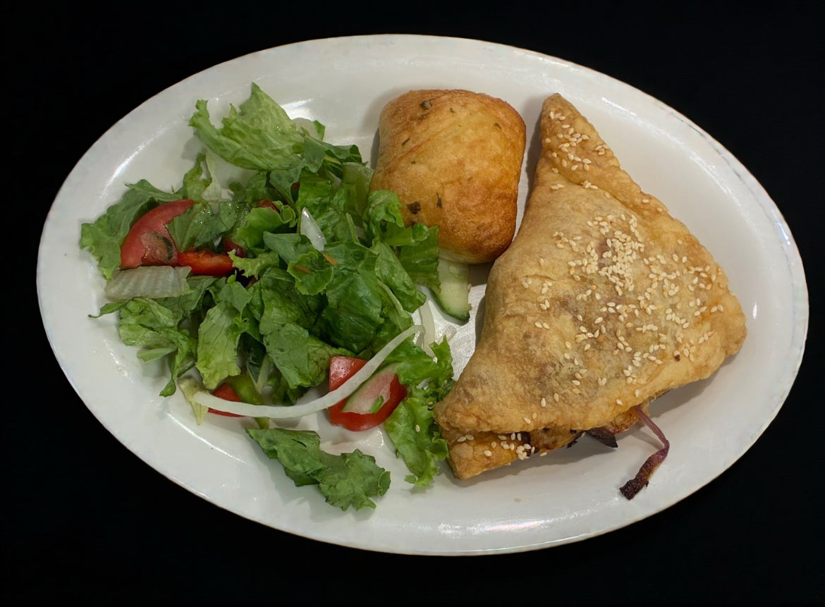 Puff pastry strudel with vegetables and cheese